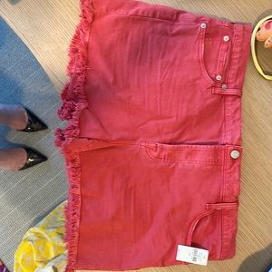 Gap 34R red shorts with frayed hem.